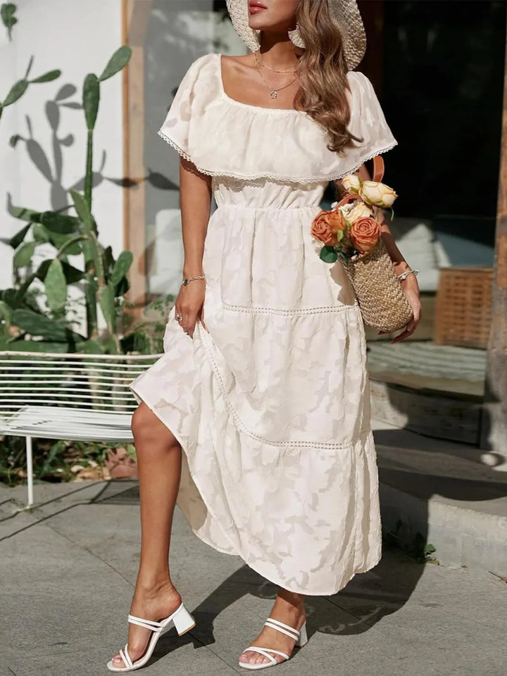 Beautiful tiered midi dress for women, off-shoulder neckline. Elegant and perfect for wedding guests.