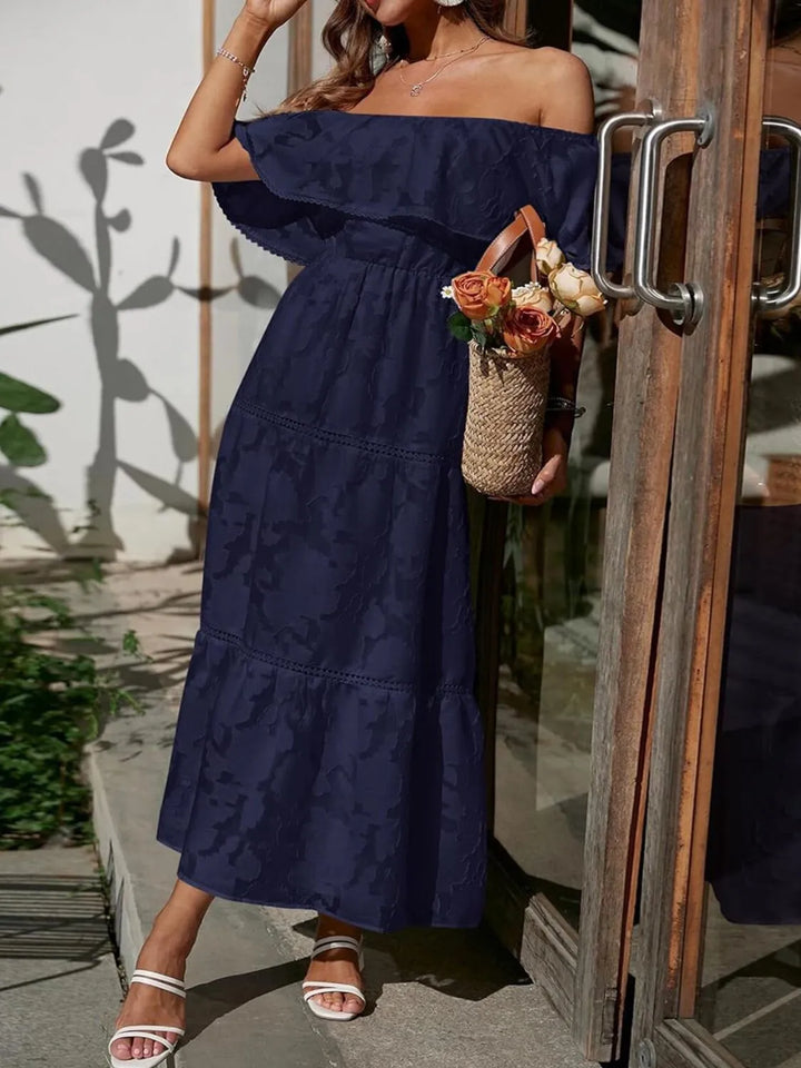 Stylish women's tiered midi dress with an off-shoulder design. Perfect summer wedding guest attire.