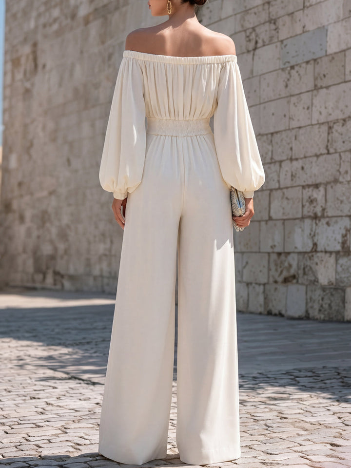 Flowing women's off-shoulder maxi dress, sophisticated for special occasions or summer parties.