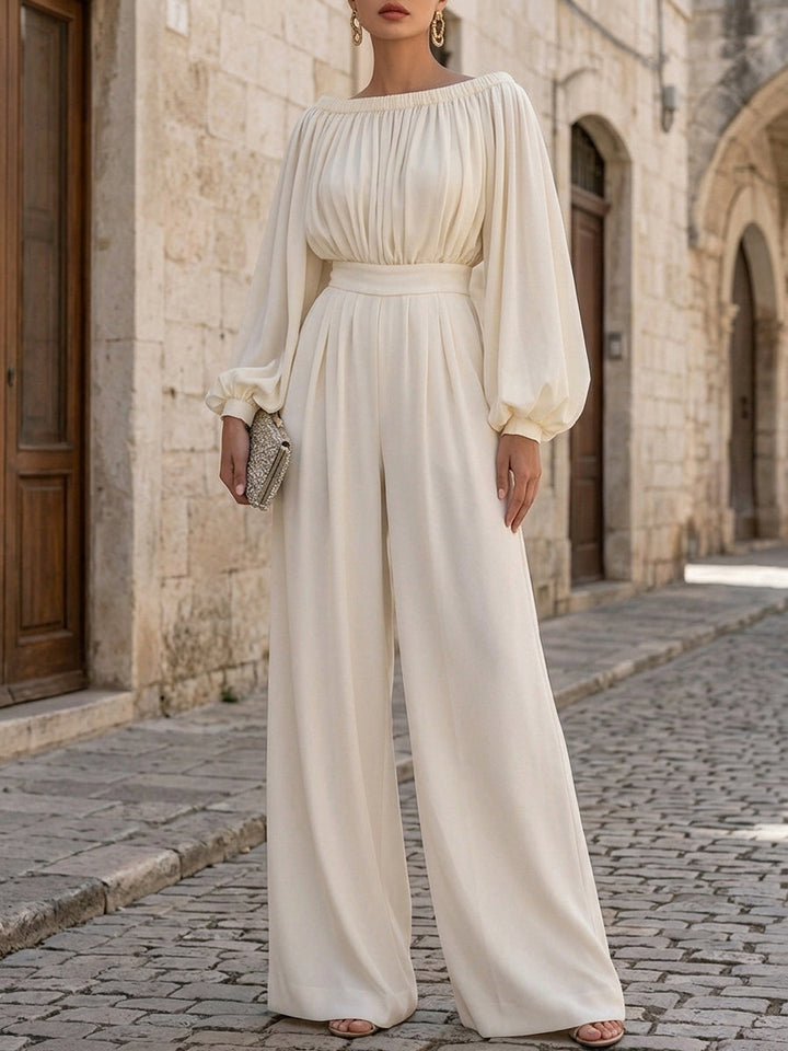 Stunning off-shoulder white formal maxi dress, features elegant bishop sleeves, ideal for evening wear.