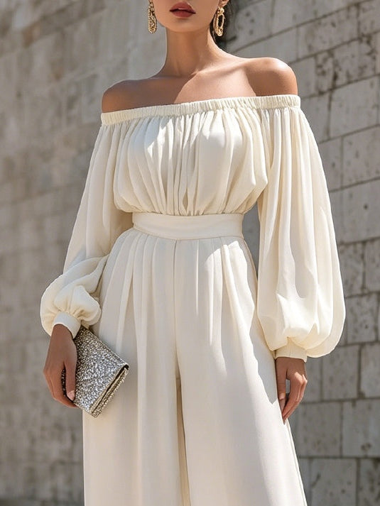 Elegant off-shoulder summer maxi dress with voluminous bishop sleeves, great for beach weddings or parties.