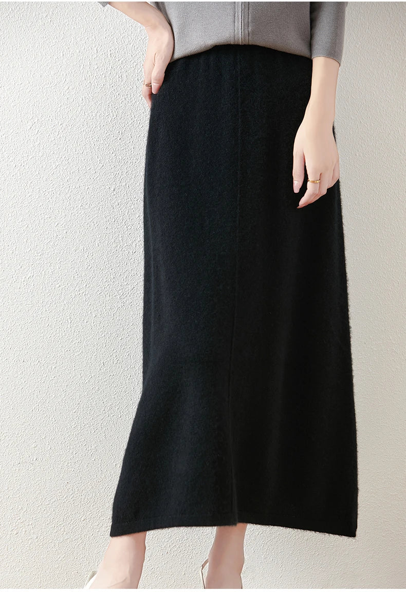 Stylized shot of an olive merino wool knit maxi skirt, emphasizing its elegance and modern design.