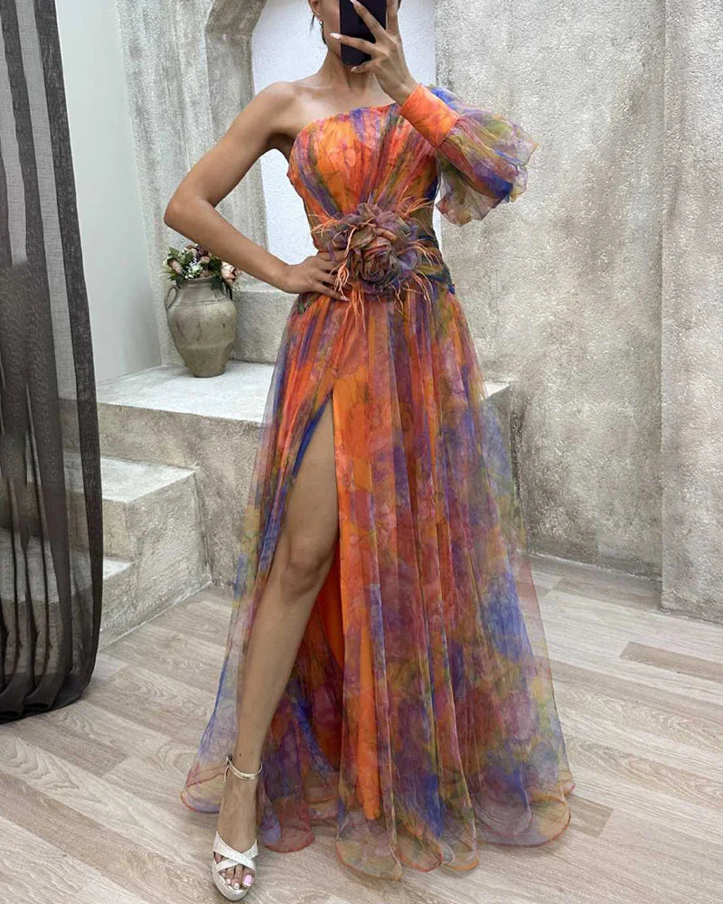 Stylish women's one-shoulder floral print maxi gown featuring a high slit, excellent for formal occasions.