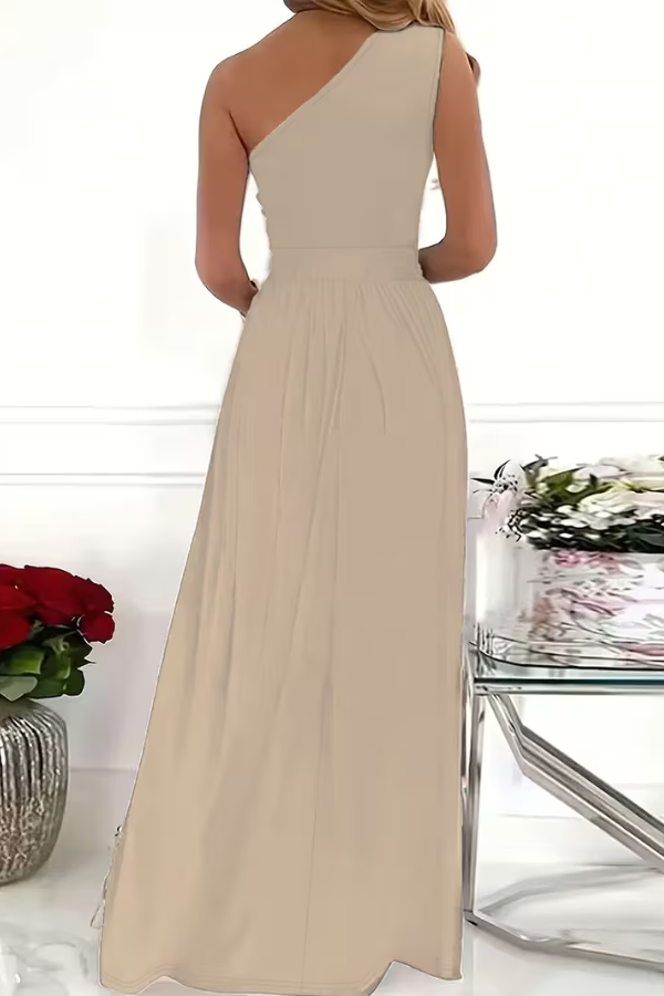 Model posing in a slim fit one-shoulder maxi dress, ideal for formal evening events & celebrations.