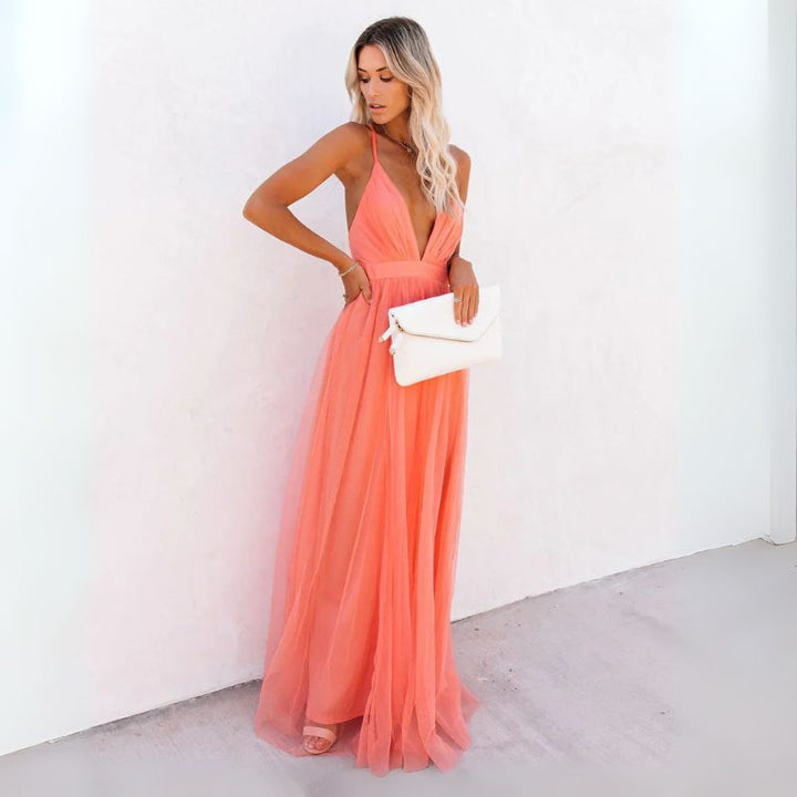 Formal orange maxi dress for women, featuring a chic V-neck and sleeveless cut, great for evening wear.