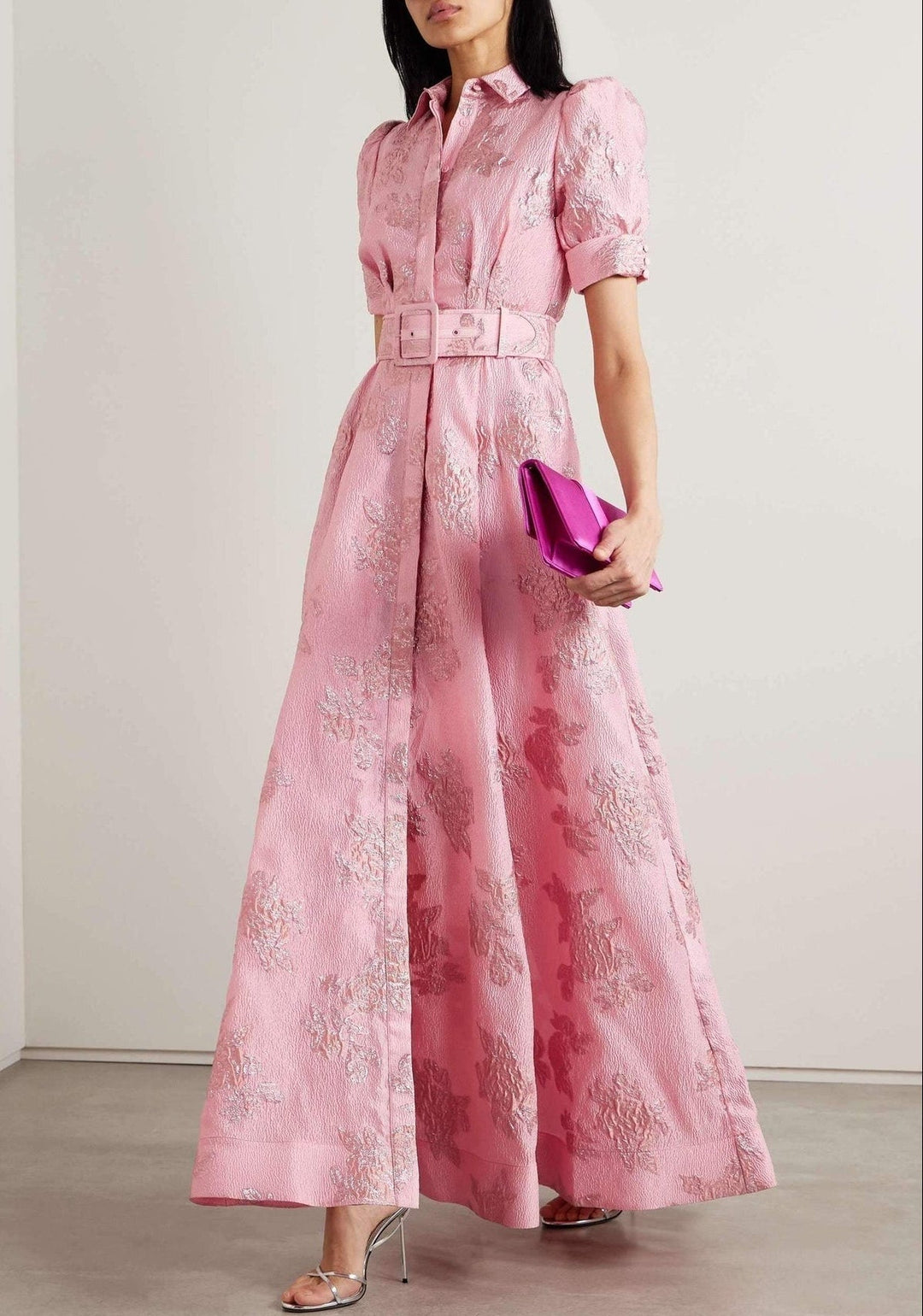 Elegant pink A-line maxi dress for wedding guests. Features delicate puff sleeves, perfect for formal events.