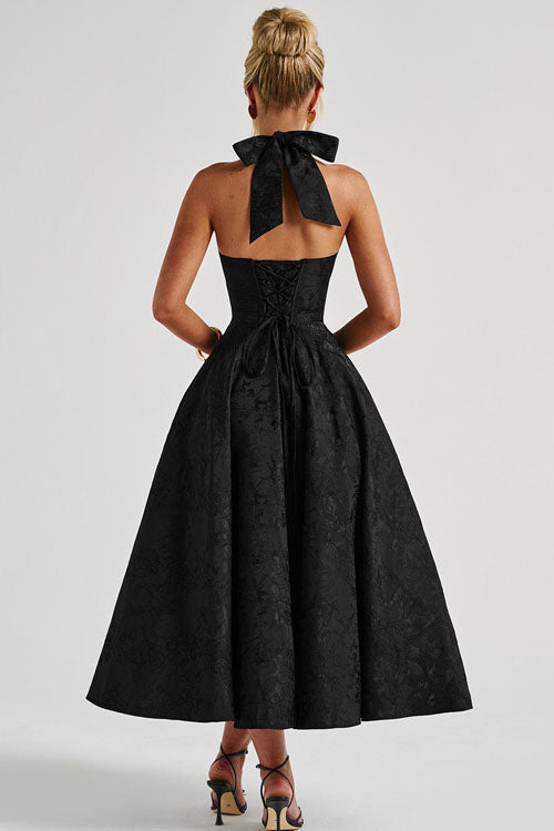 Sophisticated black floral midi dress, halter neck, corset style.