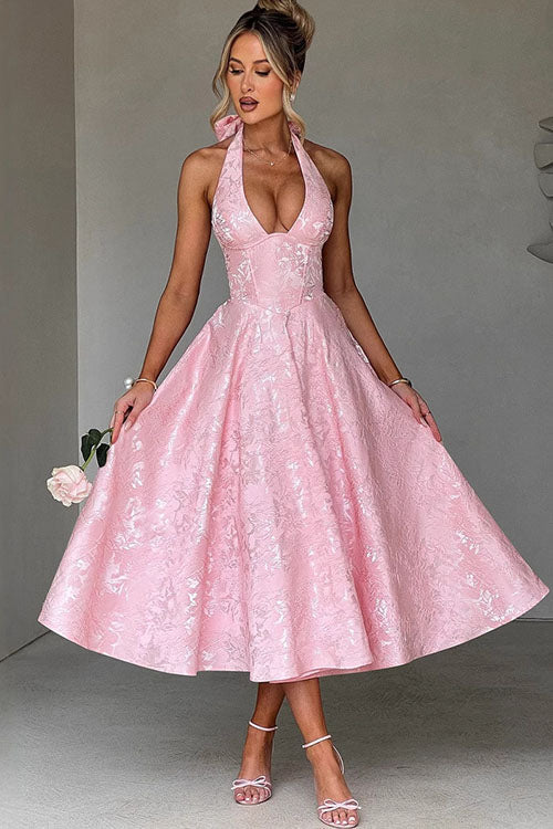 Women's pink floral halter midi dress with a corset waist.