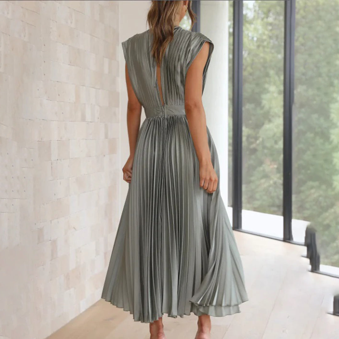 Elegant women's V-neck pleated midi dress, ideal for sophisticated evening wear.