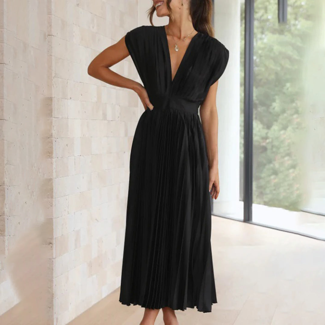 Chic V-neck pleated midi dress, an elegant choice for wedding celebrations.