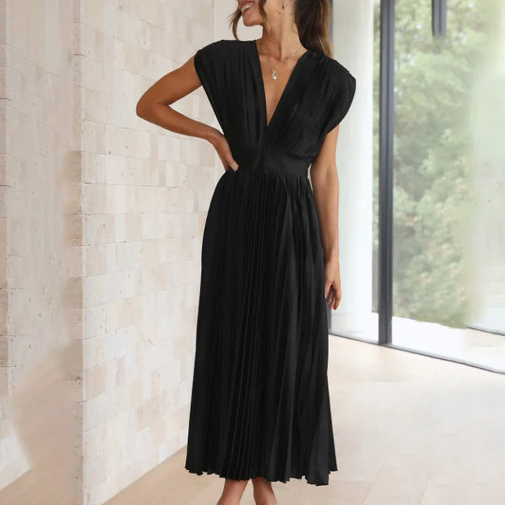 Chic V-neck pleated midi dress, an elegant choice for wedding celebrations.