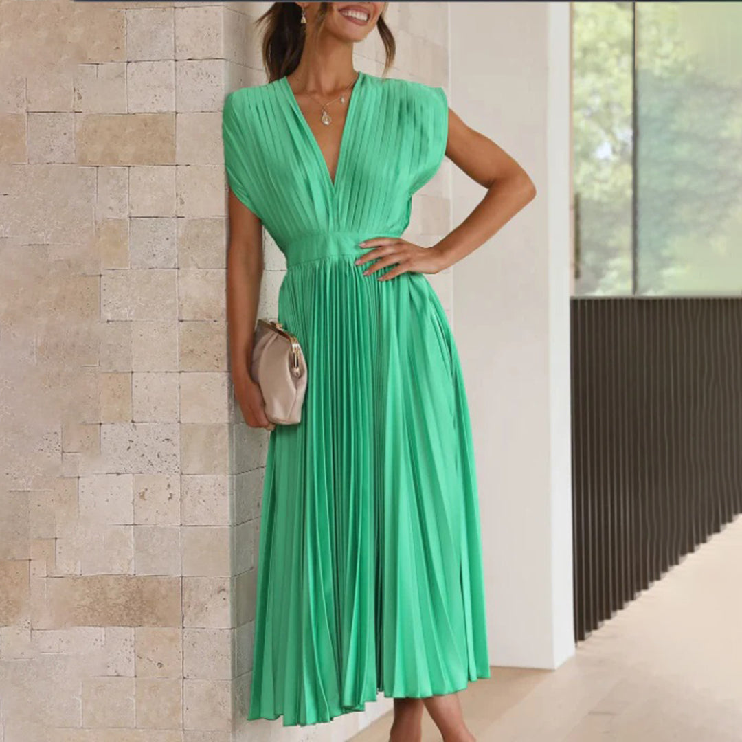 Sophisticated pleated midi dress with V-neck, ideal for wedding attendees.