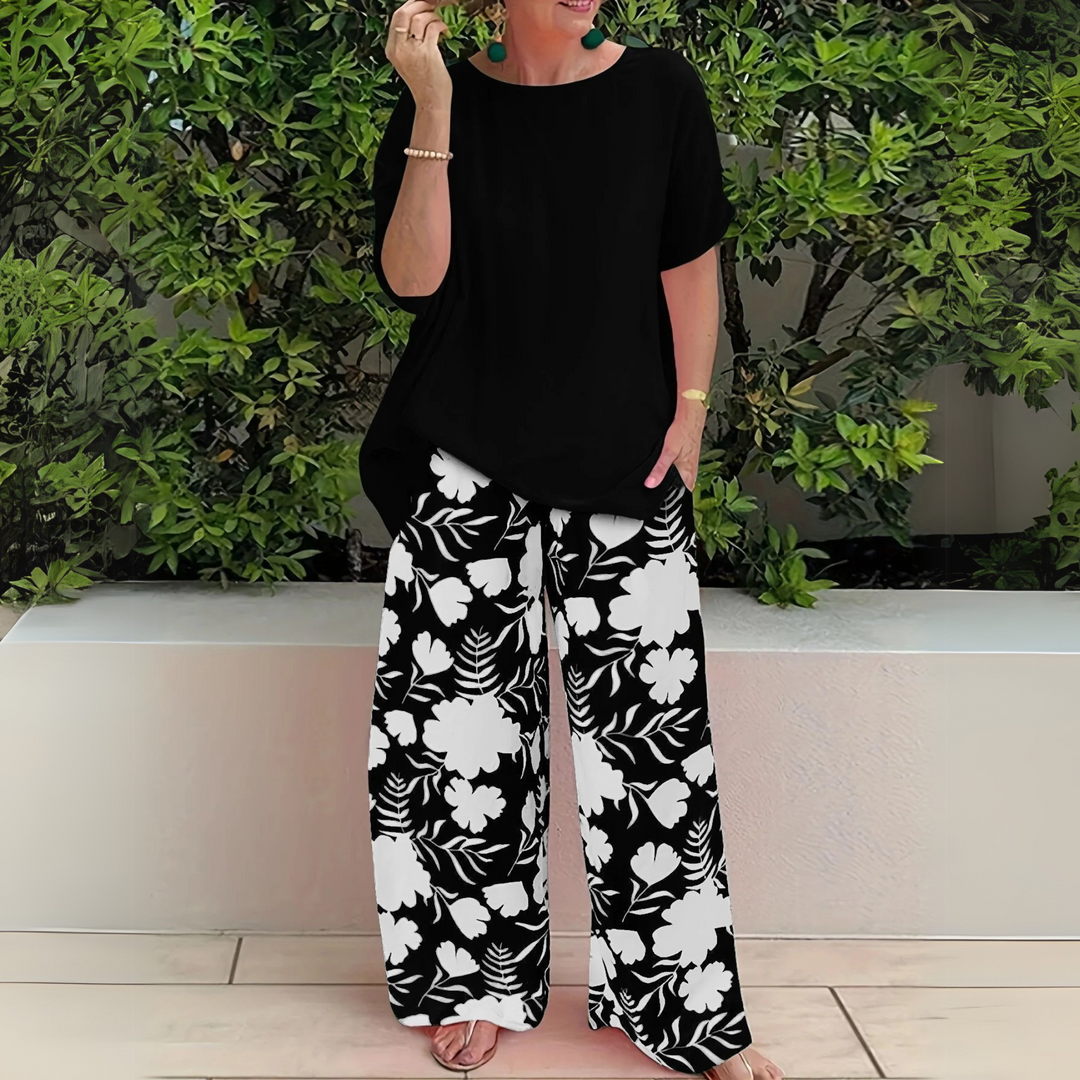Women's plus size floral print two-piece set, an elegant and comfortable ensemble with breathable fabric and wide-leg pants.