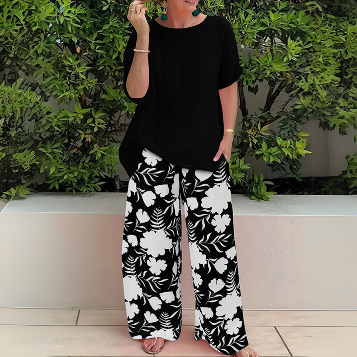Women's plus size floral print two-piece set, an elegant and comfortable ensemble with breathable fabric and wide-leg pants.
