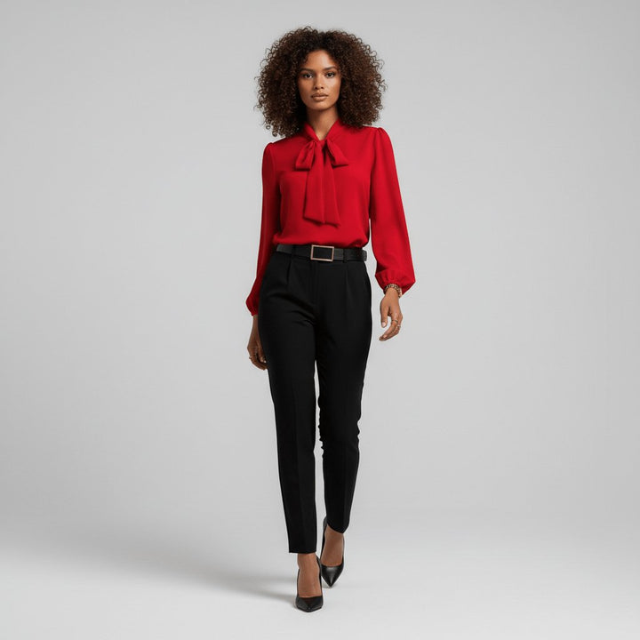 Women's elegant puff sleeve blouse, perfect for day to night wear, with a sophisticated bow tie neck.