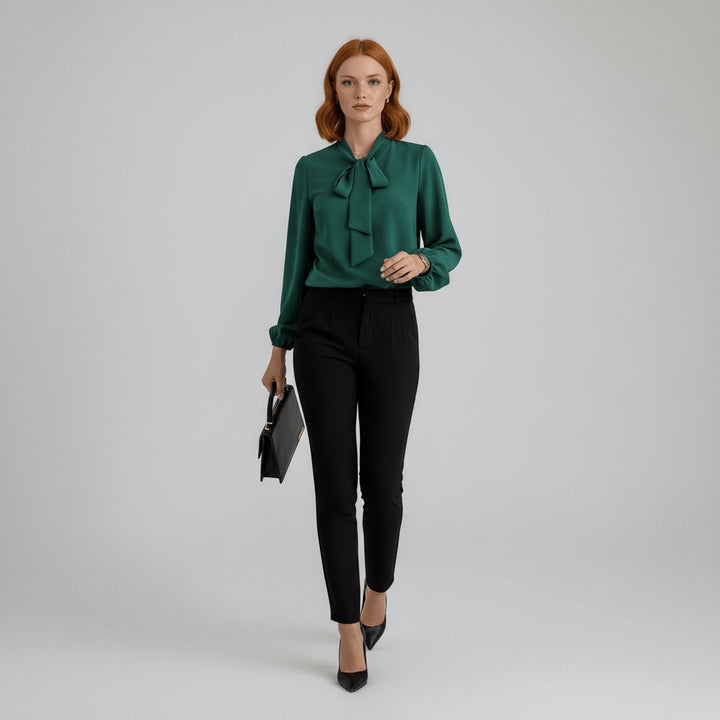 Classic white women's blouse with an elegant bow tie neck and fashionable puff sleeves, a chic top.