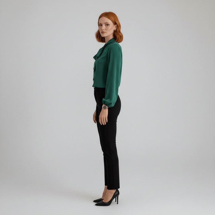 Black women's workwear top, an elegant bow tie blouse with subtle puff long sleeves for a refined look.