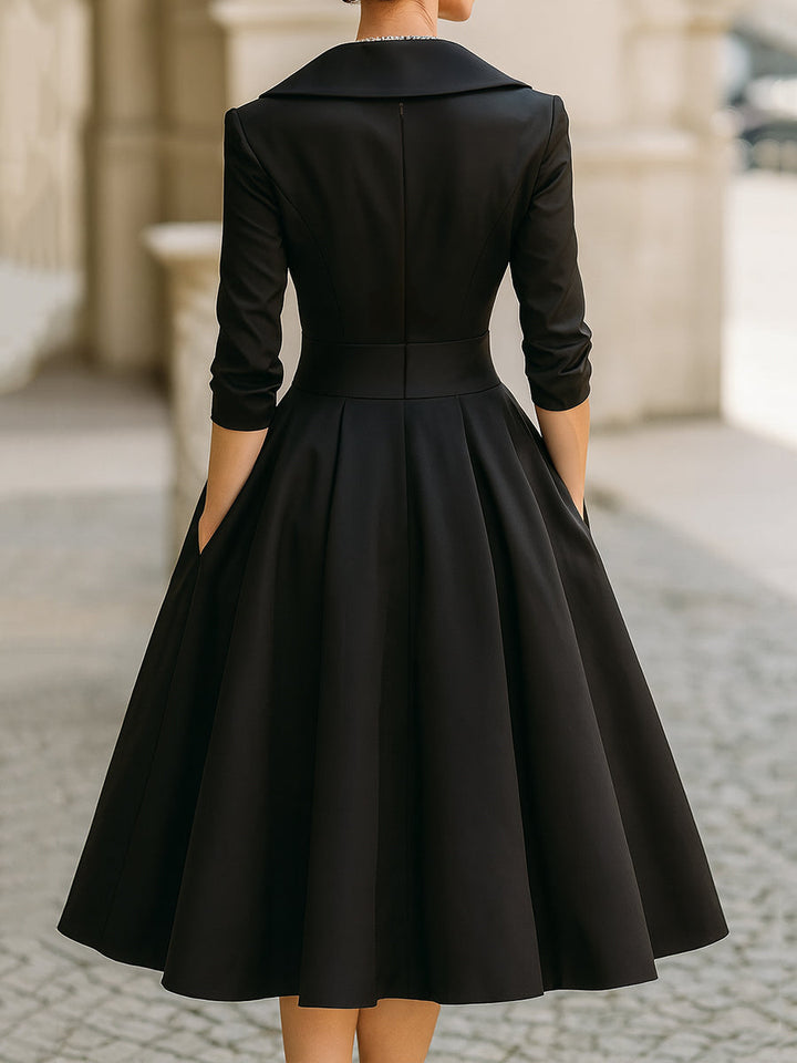 Classic black retro midi dress for women, a formal evening gown with an elegant draped collar.