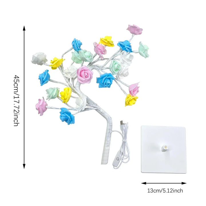 Rose LED USB night light on a bedside table, providing romantic ambiance. A charming decorative home accent.