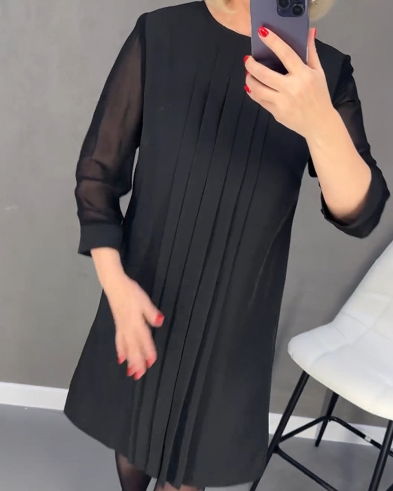 Knee-length elegant shift dress for women, featuring chic mesh details & long sleeves, ideal for fall fashion.