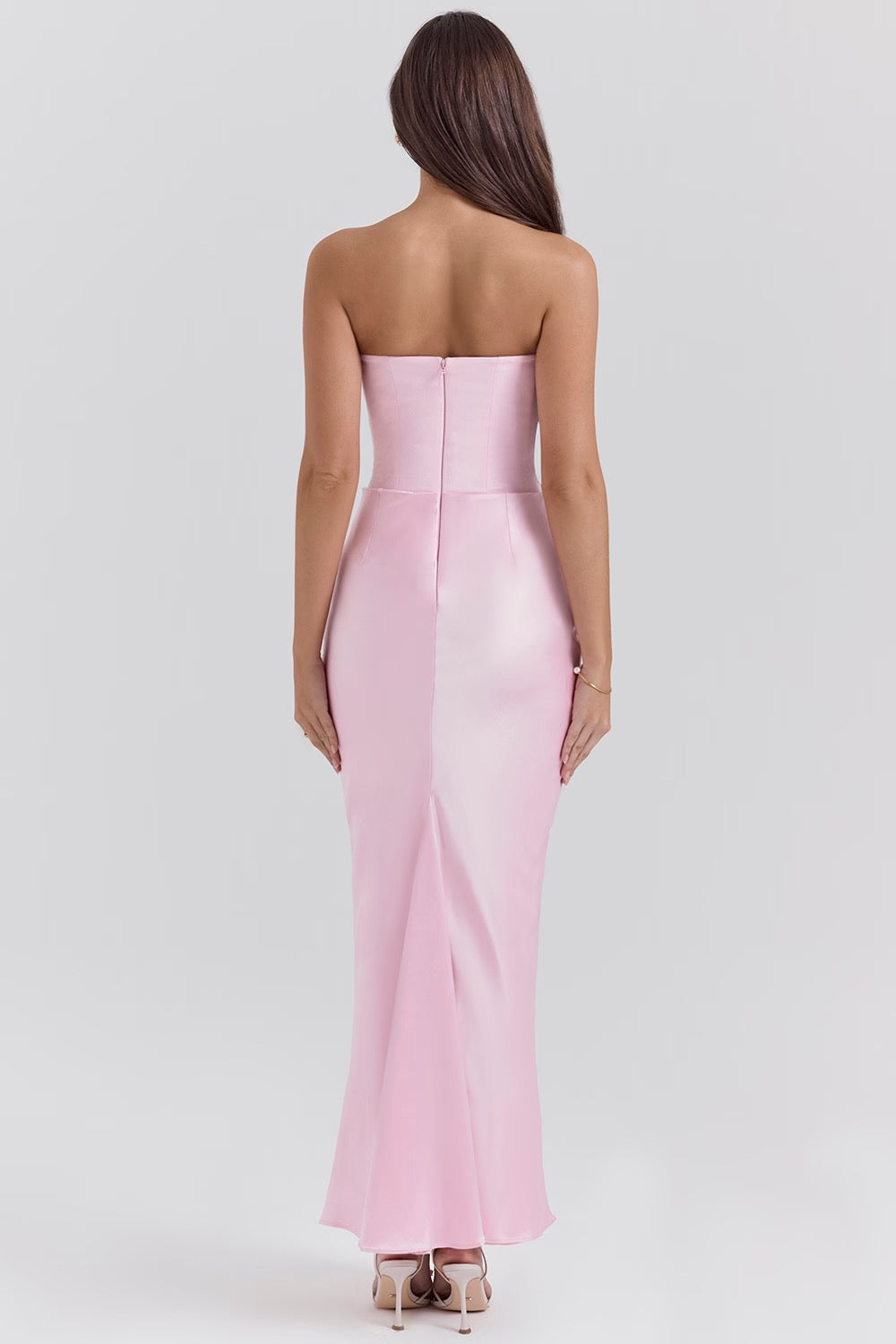 Flowing strapless corset maxi dress, a luxurious and comfortable option for wedding guests.