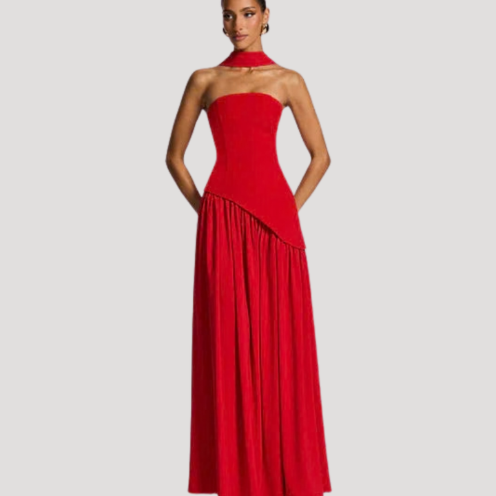 A formal strapless pleated maxi dress, an elegant choice for any special event.