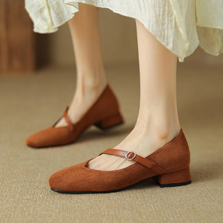 Elegant tan suede block heel pumps with buckle strap, comfortable for women's dress shoes.