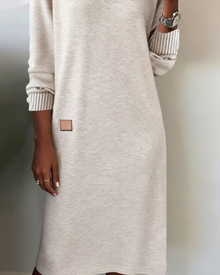 Women's comfortable V-neck long sleeve midi dress in a pullover style, ideal for office elegance.