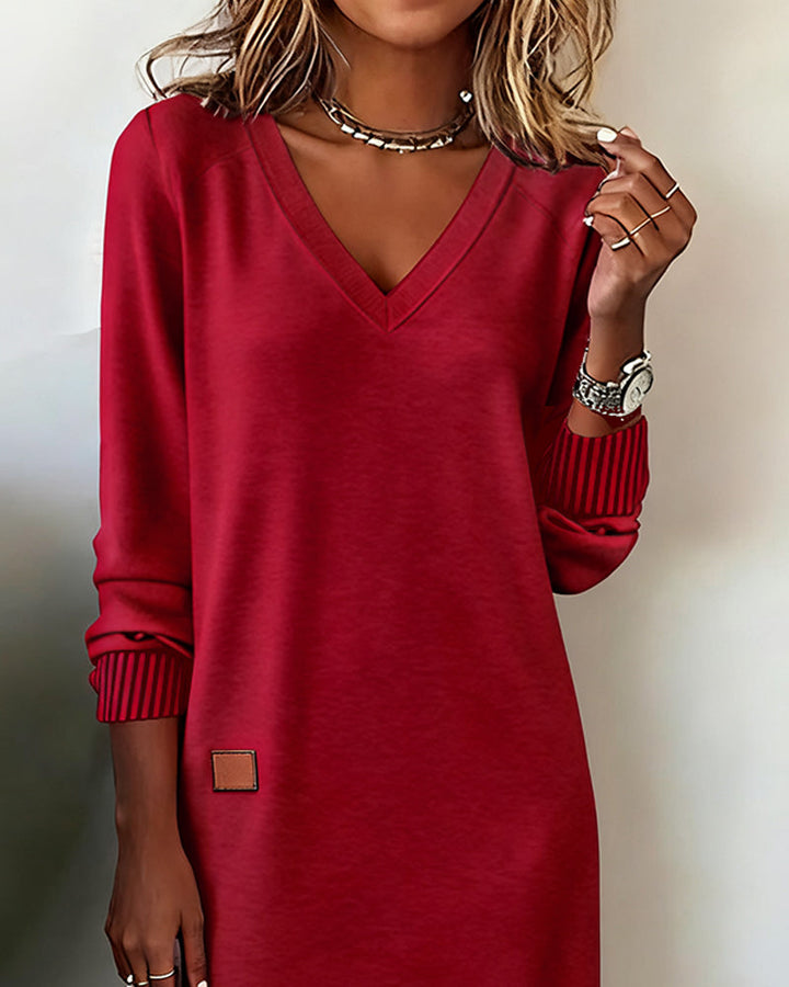 Elegant women's V-neck midi dress with long sleeves, perfect for office, casual, or daytime wear.