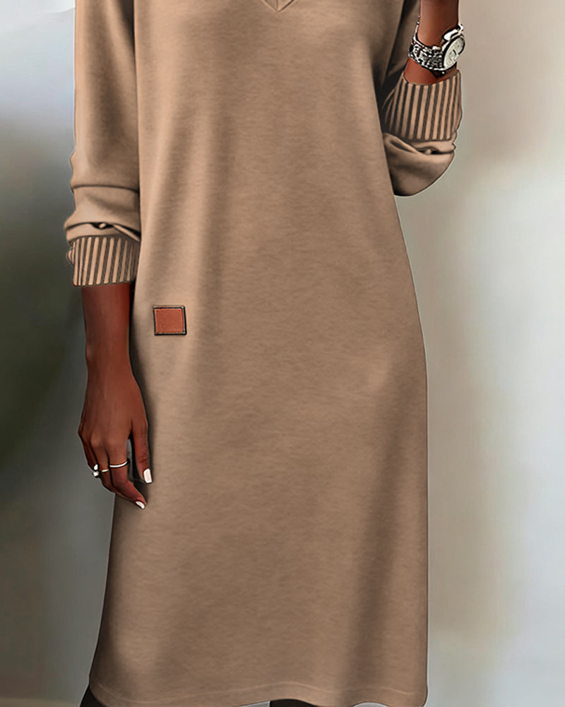 Fall/Winter women's elegant V-neck long sleeve midi dress, perfect for sophisticated daytime wear.