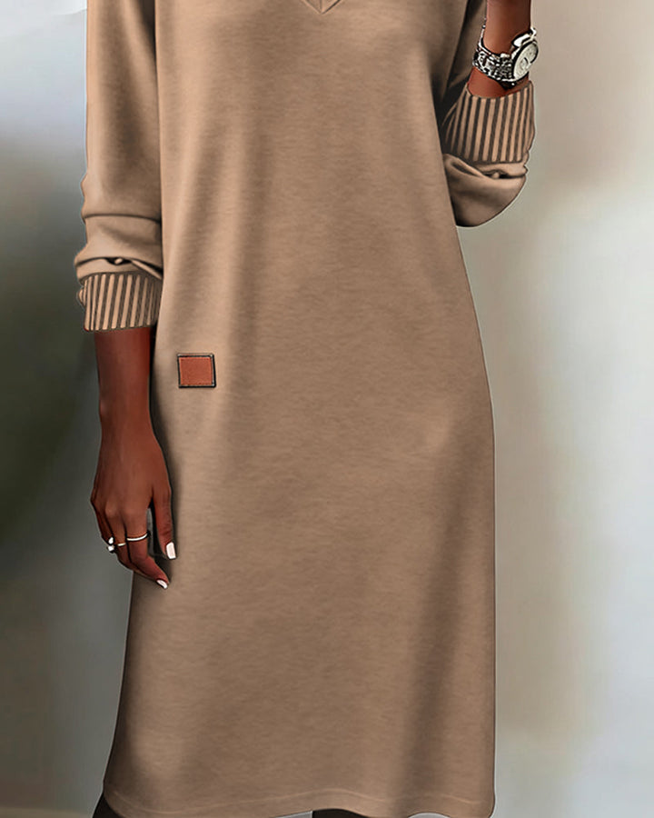 Fall/Winter women's elegant V-neck long sleeve midi dress, perfect for sophisticated daytime wear.