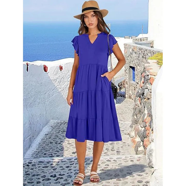 Elegant V-neck tiered midi dress for women with flutter sleeves. Perfect for casual or summer wear.