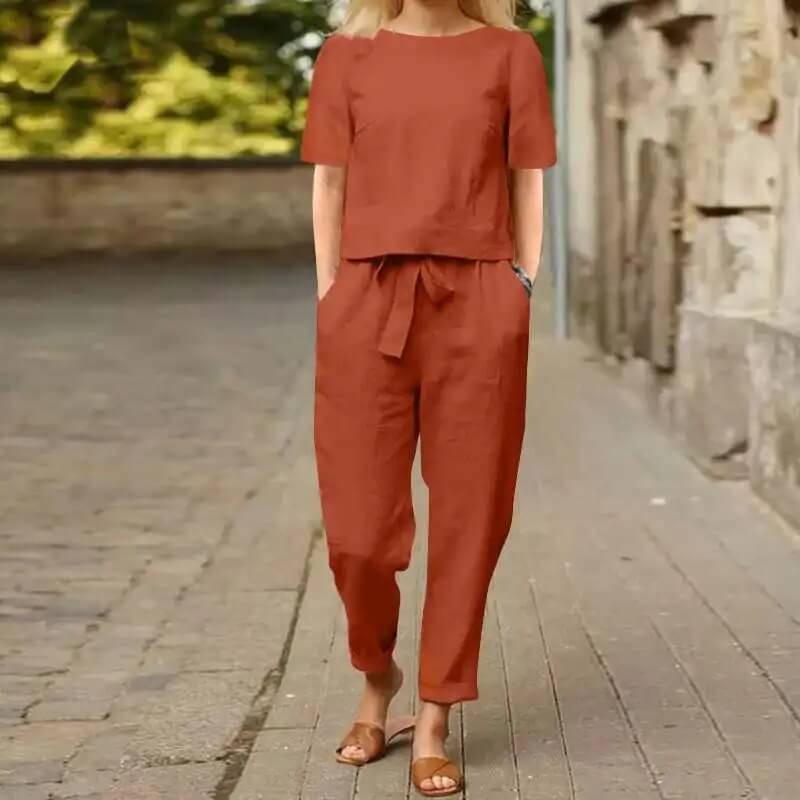 Elegant vintage women's two-piece summer set in cotton blend, perfect for casual wear or beach days. Comfortable & stylish.