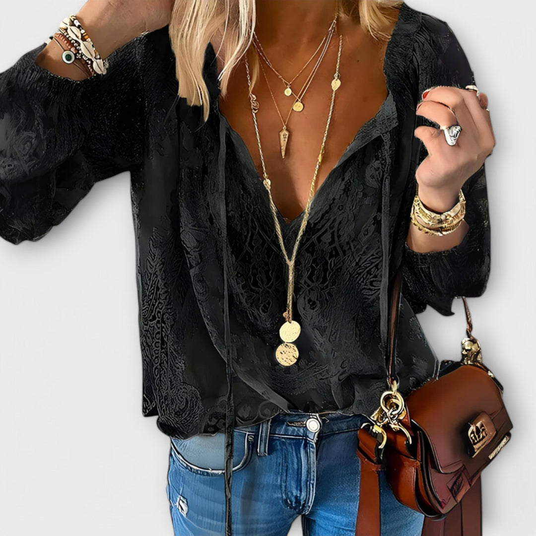 Black Brunetta tie-neck blouse for women, a versatile and elegant long sleeve top for casual or chic outfits.