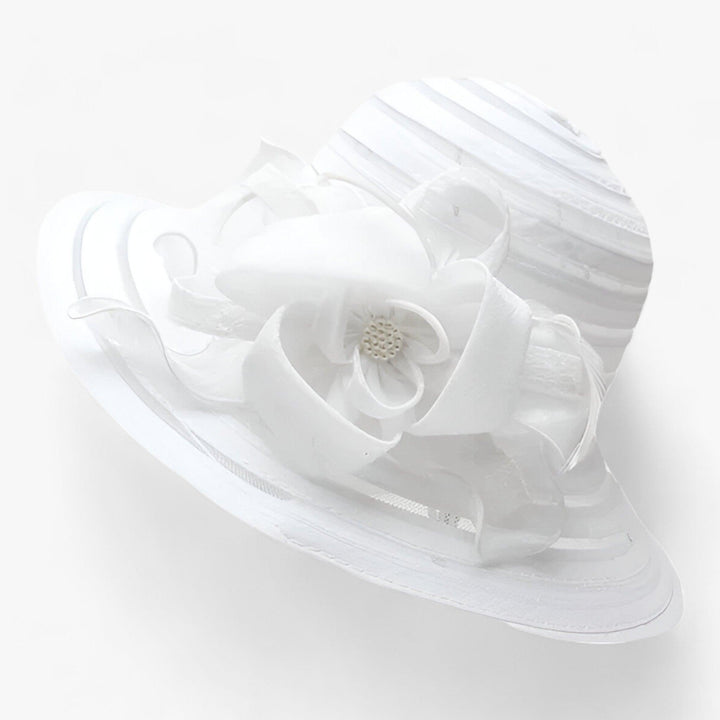 Stylish women's Mireille organza sun hat, offering chic sun protection at outdoor gatherings.
