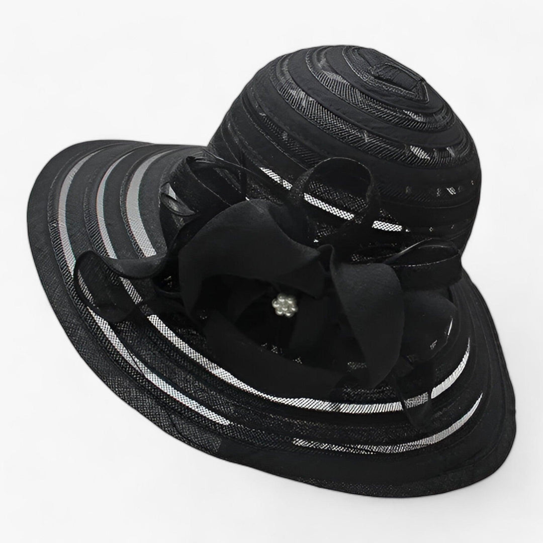 Lightweight women's organza hat with a wide brim, ideal for sophisticated garden party attire.