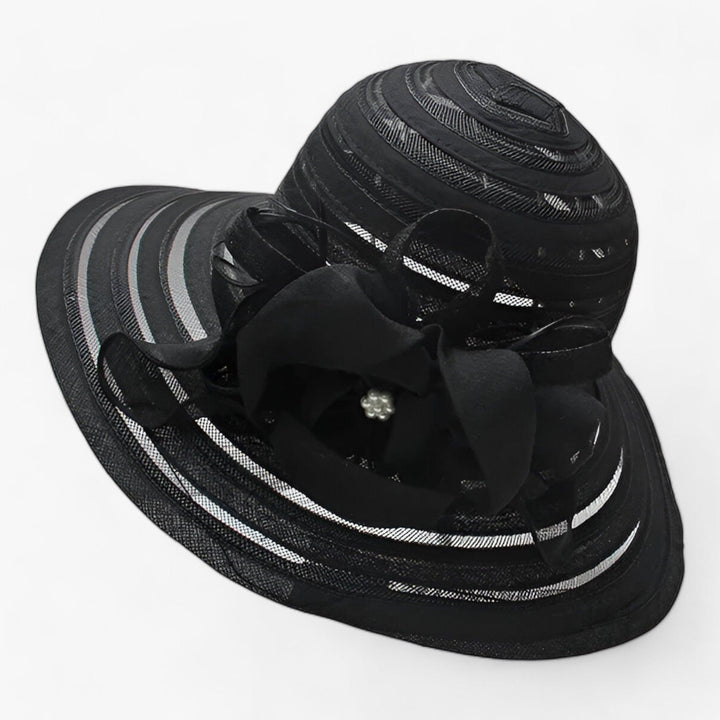Lightweight women's organza hat with a wide brim, ideal for sophisticated garden party attire.
