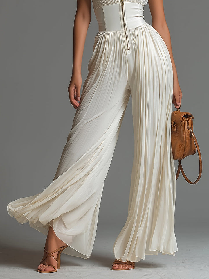 Stunning white pleated wide-leg jumpsuit for women, showcasing a deep V-neck and a stylish corset waist, party ready.