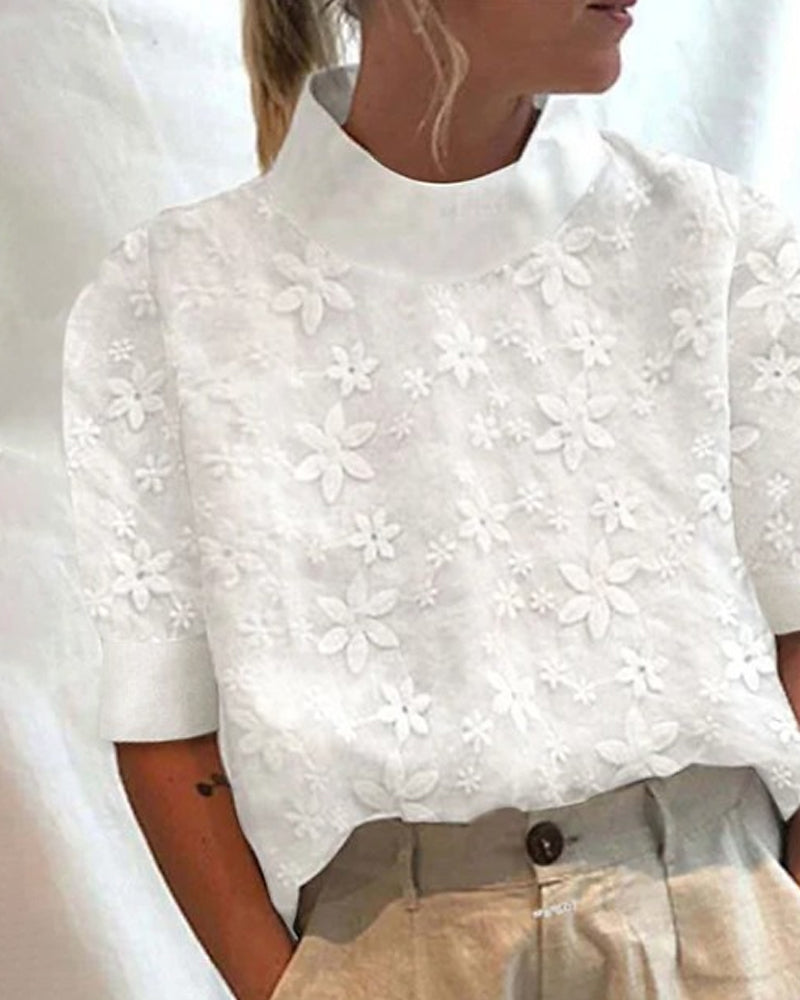 Chic white stand collar blouse for women, featuring stylish floral detail; a versatile elegant top for any occasion.
