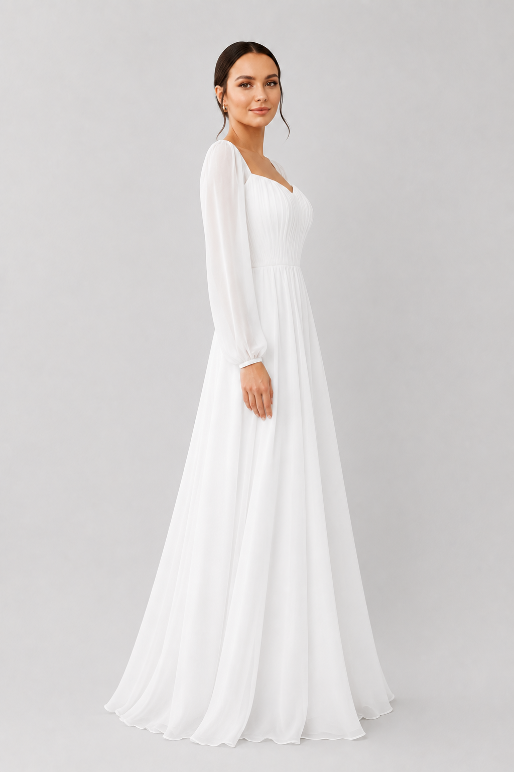Long sleeve white maxi dress for women with a flattering sweetheart neckline. Ideal for formal wear.