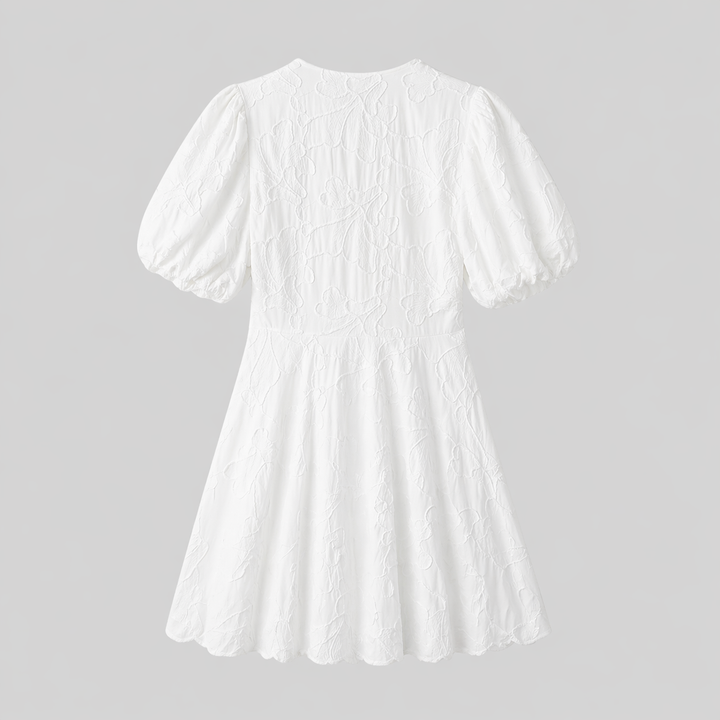 Stylish white textured floral midi dress for women, V-neck, A-line silhouette, elegant summer fashion.