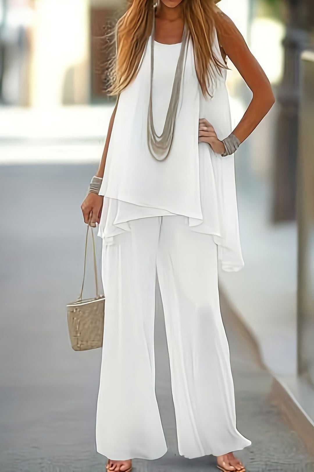 Elegant white women's two-piece coordinated outfit set for professional, semi-formal, or chic wear.