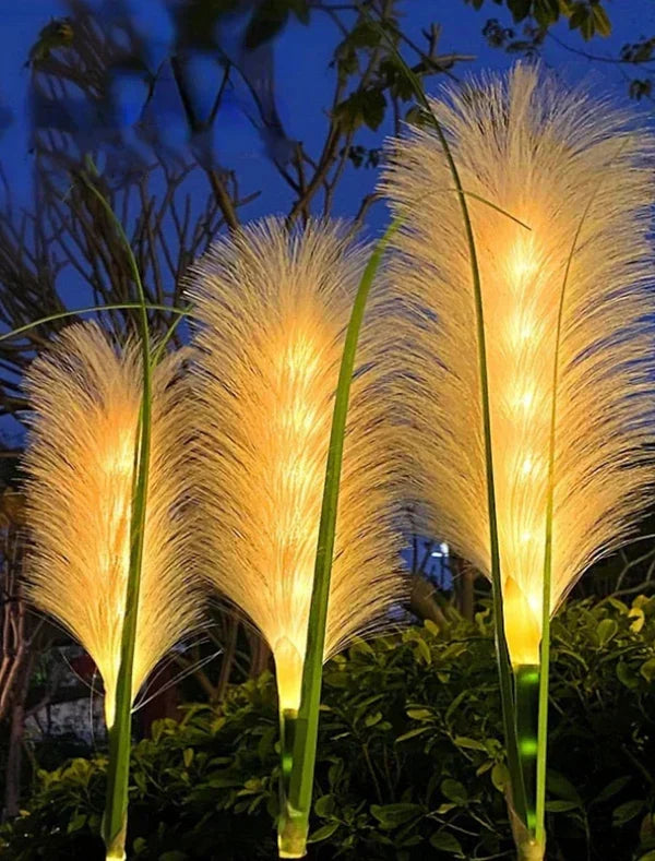 Elegant wicker-style pathway light illuminating a garden path at dusk.