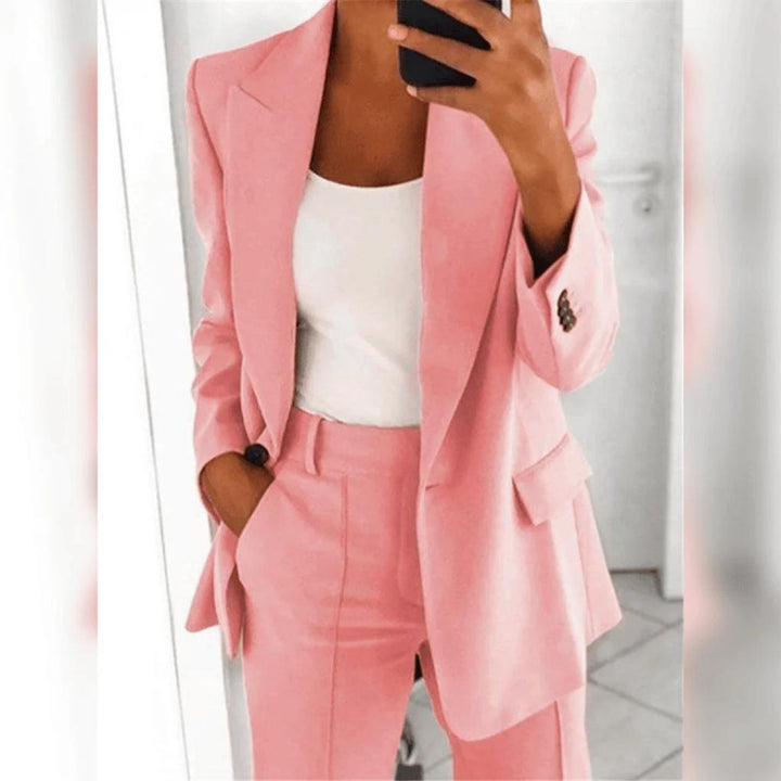 Chic women's polished 2-piece suit, a tailored blazer & pants for elegant business and formal wear.