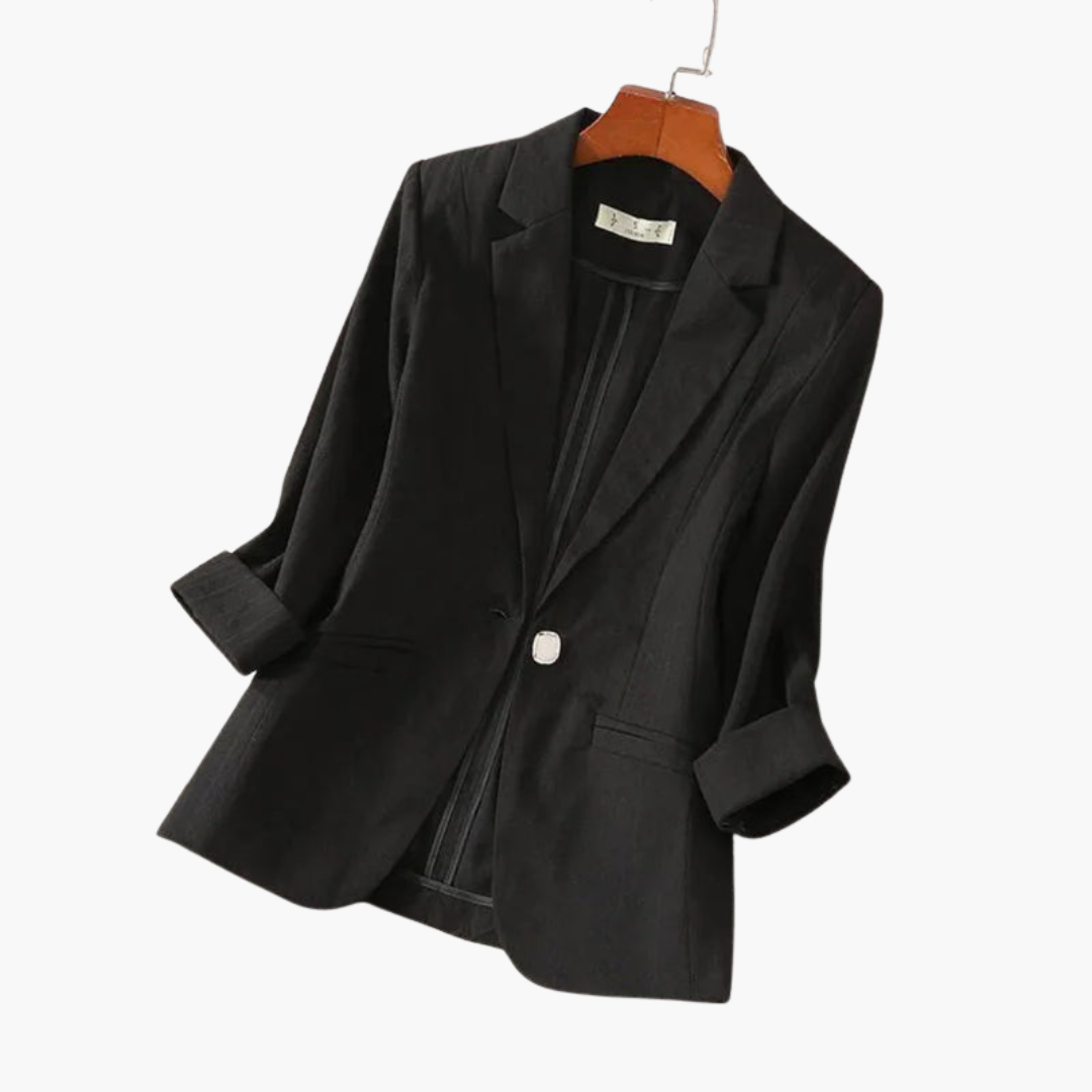 Tailored women's 3/4 sleeve blazer, an elegant workwear piece for professional office attire or casual chic.