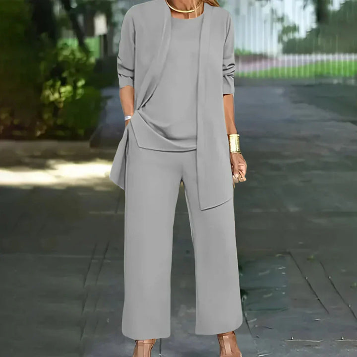 Professional women's tailored 3-piece pantsuit. Sophisticated blazer & trousers for office wear & special occasions.