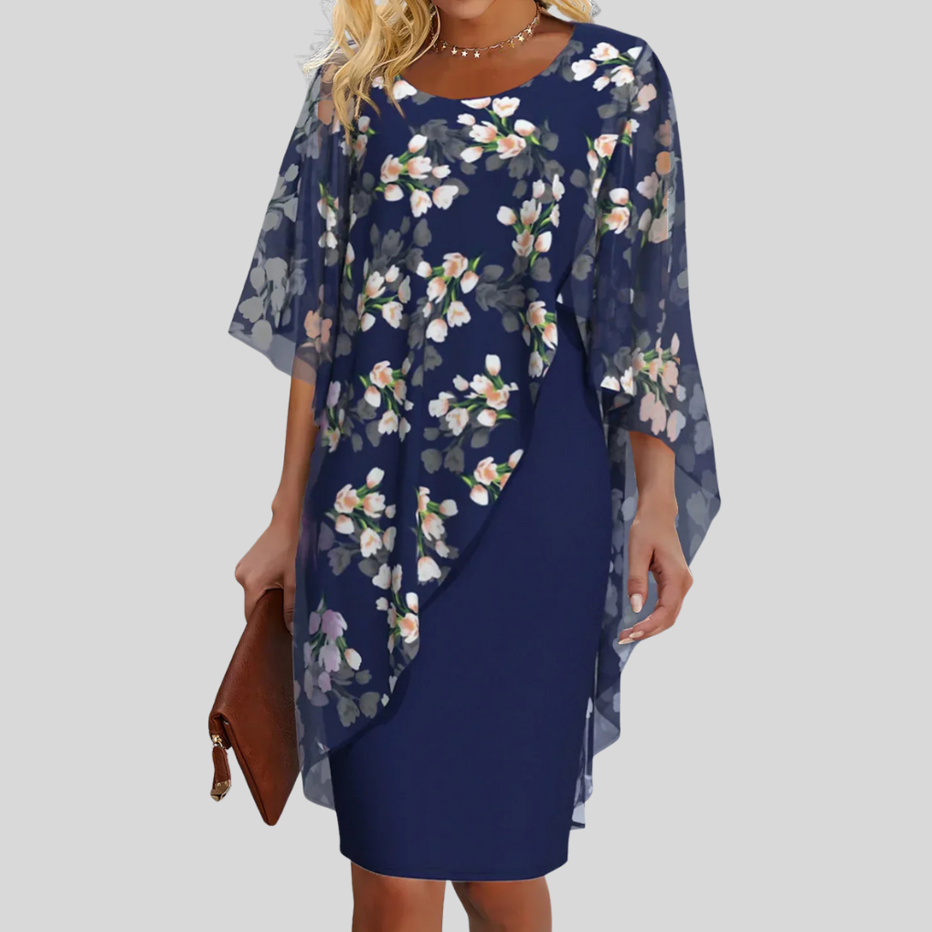 Elegant women's A-line floral print summer dress, perfect for parties & special occasions. Feminine sleeveless.