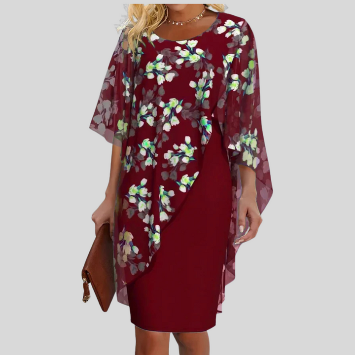 Beautiful women's floral print summer dress. A-line silhouette, ideal for elegant occasion wear & parties.