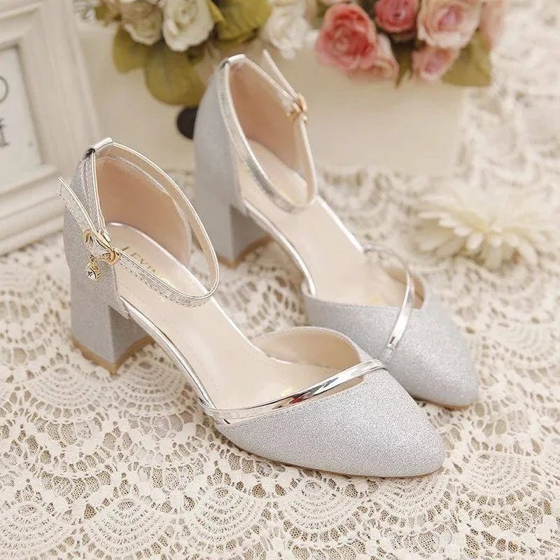 Versatile women's pumps with comfortable ankle strap & block heel. Stylish footwear for any occasion.