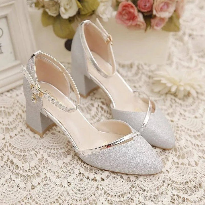 Versatile women's pumps with comfortable ankle strap & block heel. Stylish footwear for any occasion.